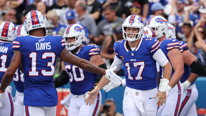 Bills quarterback Josh Allen celebrates a touchdown in a 38-10 win over the Raiders.