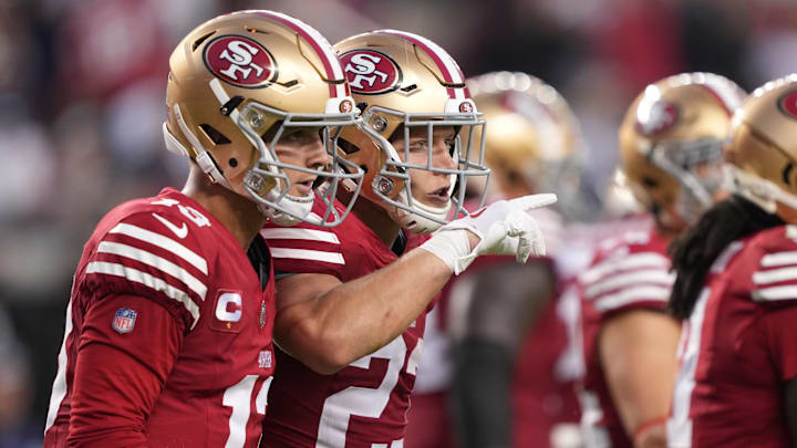 Oct 8, 2023; Santa Clara, California, USA; San Francisco 49ers running back Christian McCaffrey (right) celebrates with quarterback Brock Purdy (left) after scoring a touchdown against the Dallas Cowboys during the second quarter at Levi's Stadium. Mandatory Credit: Darren Yamashita-Imagn Images