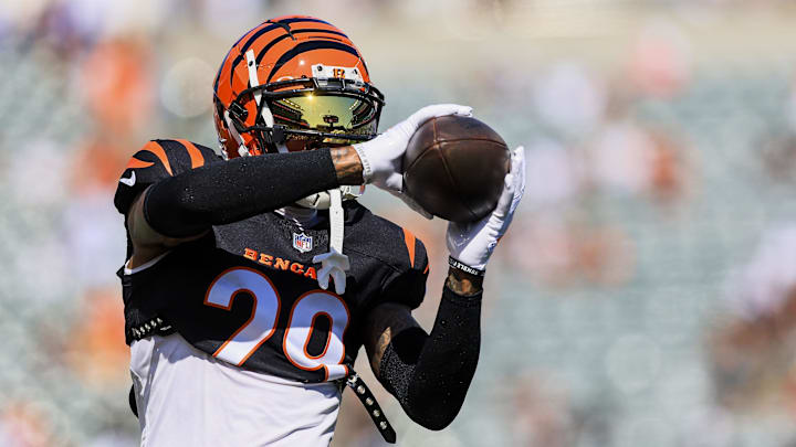 Oct 6, 2024; Cincinnati, Ohio, USA; Cincinnati Bengals cornerback Cam Taylor-Britt (29) catches a pass during warmups before the game against the Baltimore Ravens at Paycor Stadium. Mandatory Credit: Katie Stratman-Imagn Images