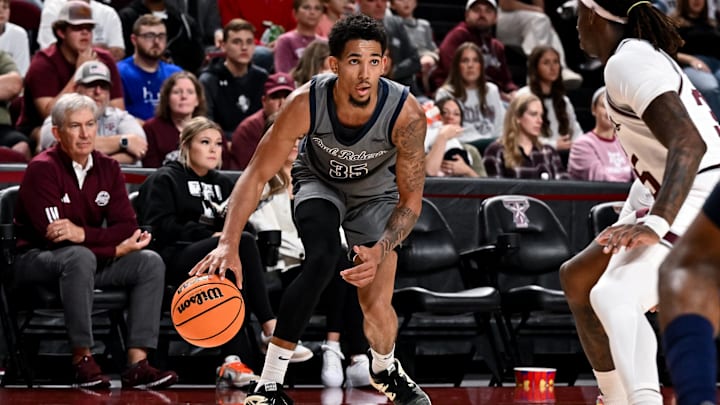 Nov 17, 2023; College Station, Texas, USA; Oral Roberts Golden Eagles guard Jailen Bedford (35) looks to pass the ball during the second half against the Texas A&M Aggies at Reed Arena. Mandatory Credit: Maria Lysaker-Imagn Images