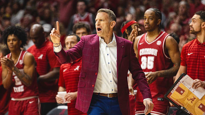Feb 15, 2025; Tuscaloosa, Alabama, USA; Alabama Crimson Tide head coach Nate Oats directs his team against the Auburn Tigers during the first half at Coleman Coliseum. Mandatory Credit: Will McLelland-Imagn Images