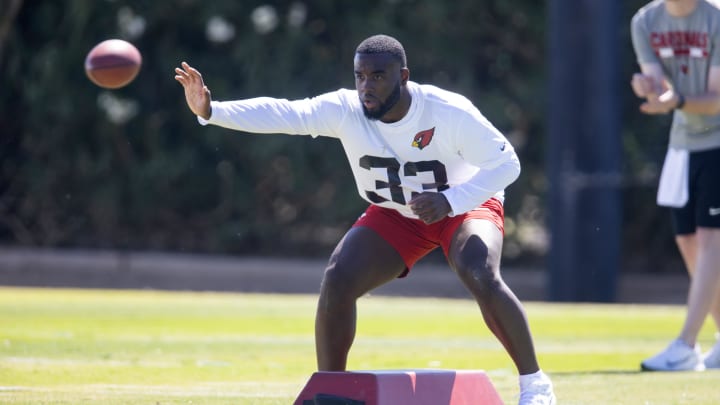 May 10, 2024; Tempe, AZ, USA; Arizona Cardinals running back Trey Benson (33) during rookie minicamp at the teams Tempe Training Facility. Mandatory Credit: Mark J. Rebilas-USA TODAY Sports