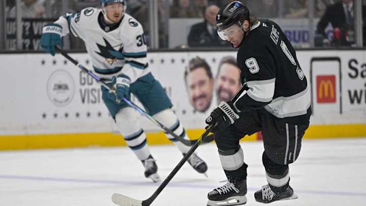 Mar 30, 2025; Los Angeles, California, USA;  Los Angeles Kings right wing Adrian Kempe (9) skates the puck down ice in the second period against the San Jose Sharks at Crypto.com Arena. Mandatory Credit: Jayne Kamin-Oncea-Imagn Images