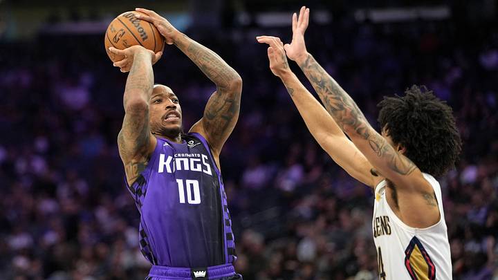 Sacramento Kings guard DeMar DeRozan (10) shoots against New Orleans Pelicans guard Micah Peavy (right) during the fourth quarter at Golden 1 Center. Sacramento Kings guard DeMar DeRozan (10) shoots against New Orleans Pelicans guard Micah Peavy (right) during the fourth quarter at Golden 1 Center.