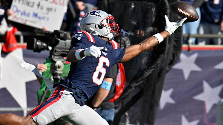 New England Patriots wide receiver Javon Baker (6) warms up before a game against the Los Angeles Rams at Gillette Stadium.
