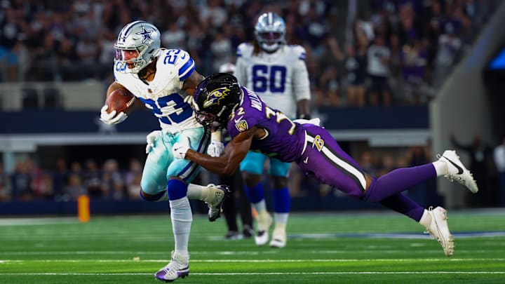Sep 22, 2024; Arlington, Texas, USA;  Baltimore Ravens safety Marcus Williams (32) dives to tackle Dallas Cowboys running back Rico Dowdle (23) during the second half at AT&T Stadium. Mandatory Credit: Kevin Jairaj-Imagn Images