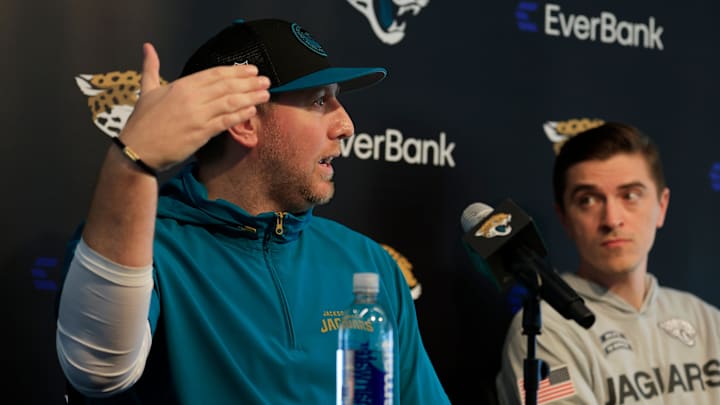 Jacksonville Jaguars head coach Liam Coen, left, speaks during a press conference next to general manager James Gladstone at Miller Electric Center Tuesday, April 15, 2025 in Jacksonville, Fla. [Corey Perrine/Florida Times-Union]
