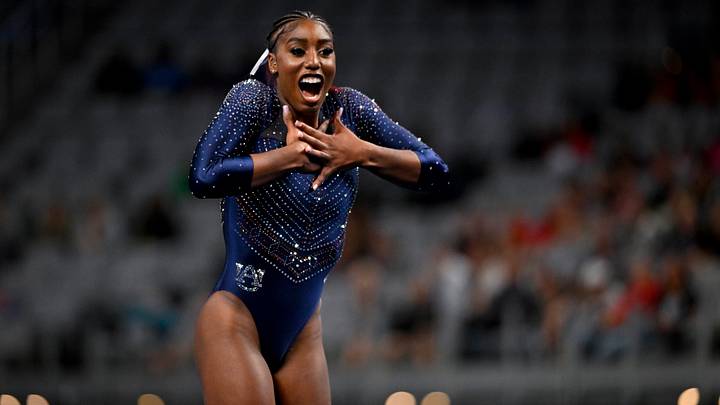 Apr 13, 2023; Fort Worth, TX, USA; Auburn University gymnast Derrian Gobourne performs on floor routine during the NCAA Women's National Gymnastics Tournament Semifinal at Dickies Arena. Mandatory Credit: Jerome Miron-USA TODAY Sports