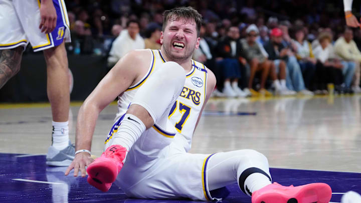 Mar 16, 2025; Los Angeles, California, USA; Los Angeles Lakers guard Luka Doncic (77) reacts against the Phoenix Suns in the second half at Crypto.com Arena. Mar 16, 2025; Los Angeles, California, USA; Los Angeles Lakers guard Luka Doncic (77) reacts against the Phoenix Suns in the second half at Crypto.com Arena.