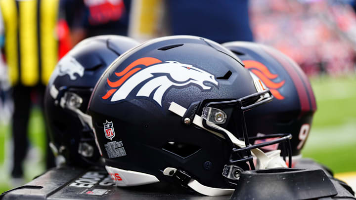 Aug 25, 2024; Denver, Colorado, USA; Detail view of the helmets worn by the Denver Broncos during the second half against the Arizona Cardinals t Empower Field at Mile High. Mandatory Credit: Ron Chenoy-Imagn Images