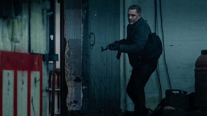 In his search for Brendan and Seraphina, Harry (Tom Hardy) dishes out carnage via firepower in MobLand episode 7. Photo Credit: Luke Varley/Paramount+