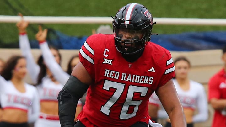 Oct 19, 2024; Lubbock, Texas, USA; Texas Tech Red Raiders offensive tackle Caleb Rogers (76) blocks against the Baylor Bears in the first half at Jones AT&T Stadium and Cody Campbell Field. Mandatory Credit: Michael C. Johnson-Imagn Images Oct 19, 2024; Lubbock, Texas, USA; Texas Tech Red Raiders offensive tackle Caleb Rogers (76) blocks against the Baylor Bears in the first half at Jones AT&T Stadium and Cody Campbell Field. Mandatory Credit: Michael C. Johnson-Imagn Images