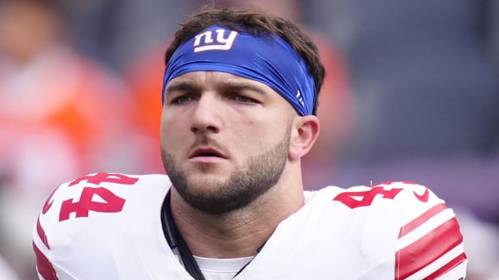 New York Giants running back Cam Skattebo (44) warms up before the game against the Denver Broncos at Empower Field at Mile High.