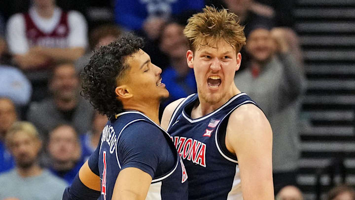 Arizona Wildcats forward Henri Veesaar (13) celebrates with Arizona Wildcats forward Trey Townsend (4) after a play against the Duke Blue Devils during an East Regional semifinal of the 2025 NCAA tournament.