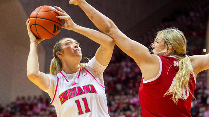 Indiana's Karoline Striplin shoots over Nebraska's Alexis Markowski during Sunday's game in Bloomington. Indiana's Karoline Striplin shoots over Nebraska's Alexis Markowski during Sunday's game in Bloomington.