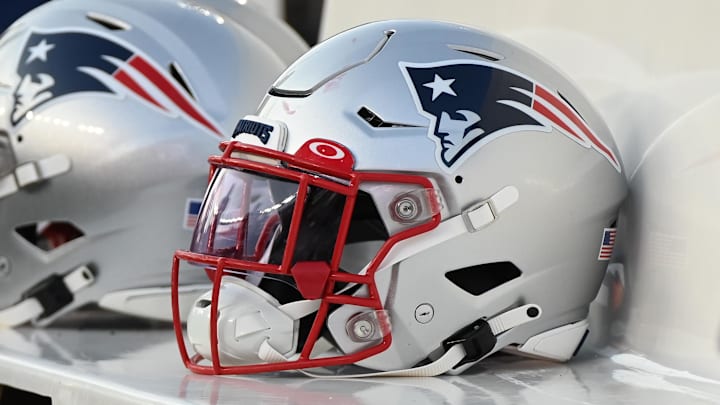 Aug 19, 2022; Foxborough, Massachusetts, USA; A Patriots helmet sits on the bench before the first half of a preseason game against the Carolina Panthers at Gillette Stadium. Mandatory Credit: Eric Canha-Imagn Images Aug 19, 2022; Foxborough, Massachusetts, USA; A Patriots helmet sits on the bench before the first half of a preseason game against the Carolina Panthers at Gillette Stadium. Mandatory Credit: Eric Canha-Imagn Images