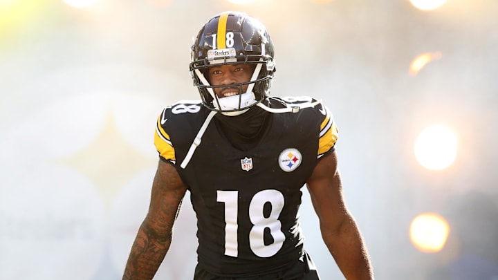 Dec 8, 2024; Pittsburgh, Pennsylvania, USA;  Pittsburgh Steelers wide receiver Mike Williams (18) reacts as he takes the field against the Cleveland Browns at Acrisure Stadium. Mandatory Credit: Charles LeClaire-Imagn Images
