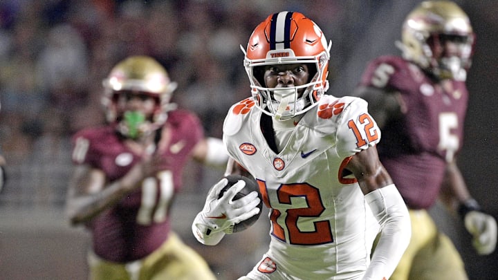 Oct 5, 2024; Tallahassee, Florida, USA; Clemson Tigers wide receiver Bryant Wesco Jr. (12) runs the ball against the Florida State Seminoles during the second half at Doak S. Campbell Stadium. 