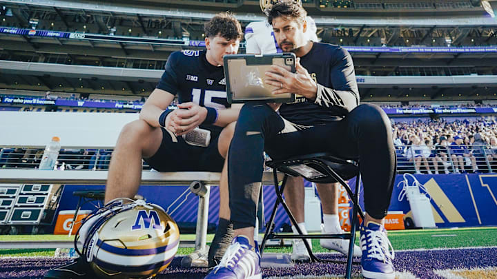 Kai Horton sits with former NFL QB JP Losman and goes over a play on an iPad. Kai Horton sits with former NFL QB JP Losman and goes over a play on an iPad.