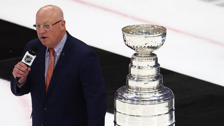 Jun 26, 2022; Tampa, Florida, USA; Deputy NHL Commissioner Bill Daly prepares to present the Colorado Avalanche with the Stanley Cup trophy after defeating the Tampa Bay Lightning during game six of the 2022 Stanley Cup Final at Amalie Arena. Mandatory Credit: Mark J. Rebilas-Imagn Images