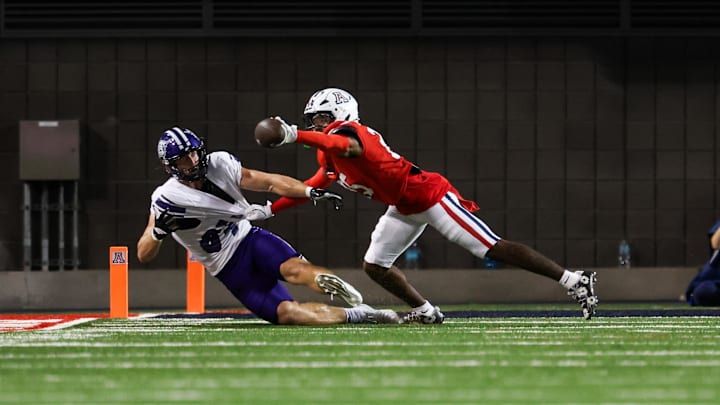Sep 6, 2025; Tucson, Arizona, USA; Arizona Wildcats defensive back Michael Dansby (25) blocks a pass intended for Weber State Wildcats tight end Noah Bennet (84) during the third quarter of the game at Arizona Stadium. Mandatory Credit: Aryanna Frank-Imagn Images