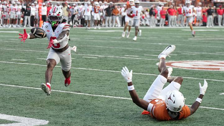 Sep 12, 2026; Austin, Texas, USA;  Ohio State Buckeyes safety Jaylen McClain (8) intercepts a pass against Texas Longhorns wide receiver Cam Coleman (8)