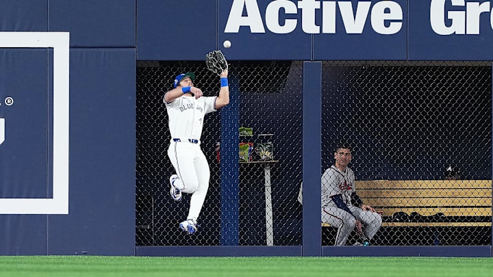 Toronto, Ontario, CAN; Toronto Blue Jays right fielder Addison Barger (47) catches a fly ball for an out against the Atlanta Braves during the first inning at Rogers Centre.