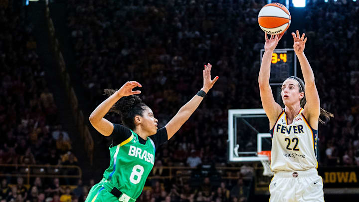 Indiana Fever Caitlin Clark (22) attempts a 3-pointer against Brazilian National Team guard Tainá Mayor da Paixão (8) on Sunday, May 4, 2025, during a preseason game between the Indiana Fever and the Brazil national team at Carver-Hawkeye Arena in Iowa City.