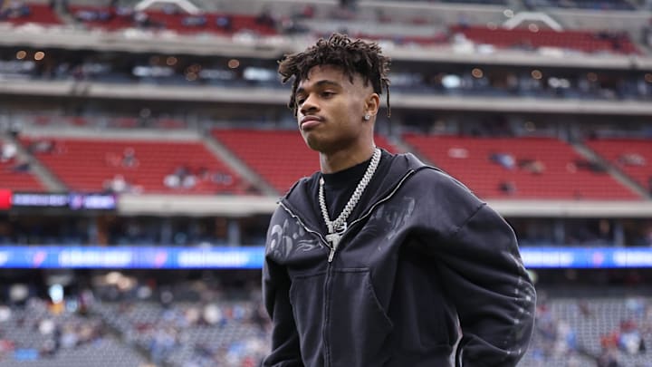 Jan 11, 2025; Houston, Texas, USA; Houston Texans wide receiver Tank Dell (3) walks on the field with crutches prior to the game against the Los Angeles Chargers in an AFC wild card game at NRG Stadium. Mandatory Credit: Troy Taormina-Imagn Images