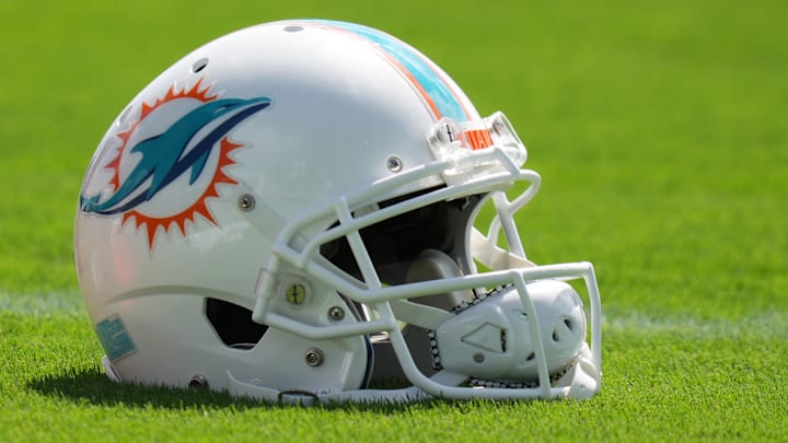 Aug 17, 2022; Miami Gardens, Florida, US; A general view of a Miami Dolphins helmet on the field during practice at Baptist Health Training Complex. Mandatory Credit: Jasen Vinlove-Imagn Images Aug 17, 2022; Miami Gardens, Florida, US; A general view of a Miami Dolphins helmet on the field during practice at Baptist Health Training Complex. Mandatory Credit: Jasen Vinlove-Imagn Images