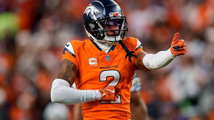 Dec 15, 2024; Denver, Colorado, USA; Denver Broncos cornerback Pat Surtain II (2) gestures after a play in the third quarter against the Indianapolis Colts at Empower Field at Mile High. Mandatory Credit: Isaiah J. Downing-Imagn Images