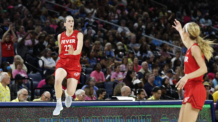 Aug 30, 2024; Chicago, Illinois, USA; Indiana Fever guard Caitlin Clark (22) celebrates after scoring against the Chicago Sky during the second half at Wintrust Arena. Mandatory Credit: Kamil Krzaczynski-Imagn Images Aug 30, 2024; Chicago, Illinois, USA; Indiana Fever guard Caitlin Clark (22) celebrates after scoring against the Chicago Sky during the second half at Wintrust Arena. Mandatory Credit: Kamil Krzaczynski-Imagn Images