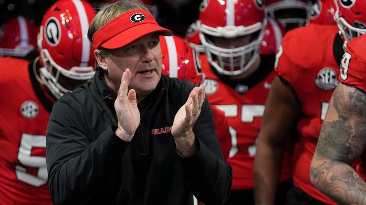Georgia coach Kirby Smart takes the field with his team before the start of the SEC championship game against Texas in Atlanta, on Saturday, Dec. 7, 2024. Georgia coach Kirby Smart takes the field with his team before the start of the SEC championship game against Texas in Atlanta, on Saturday, Dec. 7, 2024.