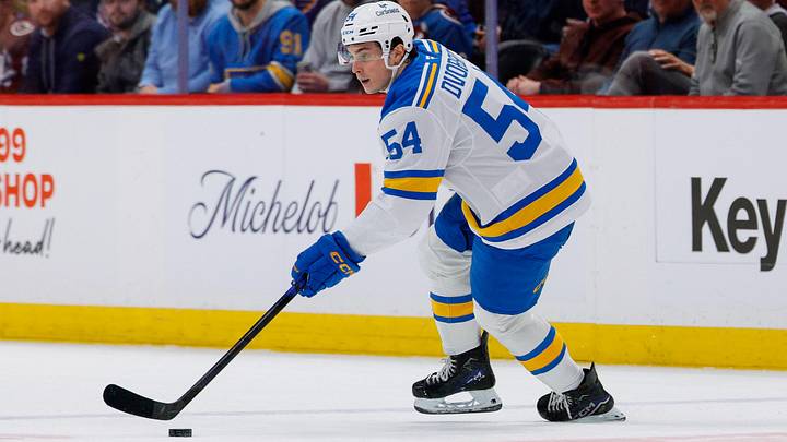 Apr 5, 2026; Denver, Colorado, USA; St. Louis Blues right wing Dalibor Dvorsky (54) controls the puck in the first period against the Colorado Avalanche at Ball Arena. Mandatory Credit: Isaiah J. Downing-Imagn Images
