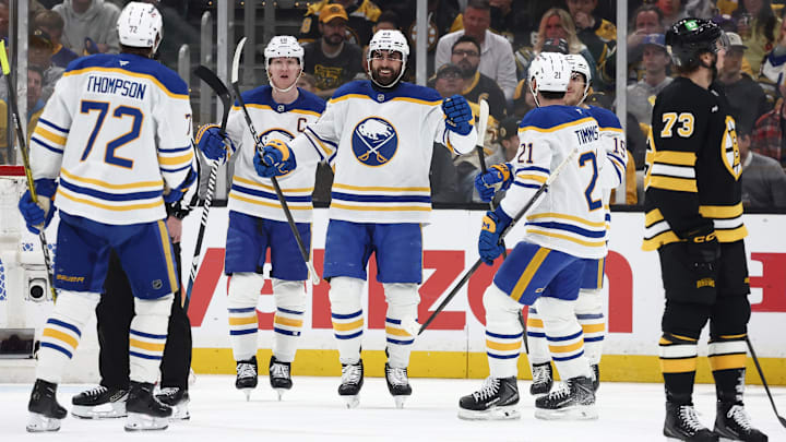 May 1, 2026; Boston, Massachusetts, USA; As Boston Bruins defenseman Charlie McAvoy (73) skates away, Buffalo Sabres right wing Alex Tuch (89) smiles at teammates after scoring during the first period of game six of the first round of the 2026 Stanley Cup Playoffs at TD Garden. Mandatory Credit: Winslow Townson-Imagn Images