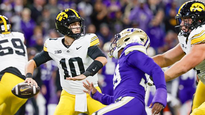 Oct 9, 2026; Seattle, Washington, USA; Iowa Hawkeyes quarterback Jeremy Hecklinski (10) passes against the Washington Huskies during the first quarter at Husky Stadium. Mandatory Credit: Joe Nicholson-Imagn Images