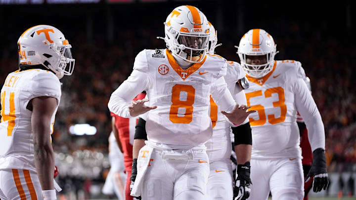 Tennessee Volunteers quarterback Nico Iamaleava (8) celebrates a touchdown during the first half of the College Football Playoff first round game against the Ohio State Buckeyes at Ohio Stadium in Columbus on Dec. 21, 2024.