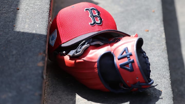 Mar 15, 2019; Tampa, FL, USA; Boston Red Sox hat and glove lay in the dugout at George M. Steinbrenner Field. Mandatory Credit: Kim Klement-Imagn Images Mar 15, 2019; Tampa, FL, USA; Boston Red Sox hat and glove lay in the dugout at George M. Steinbrenner Field. Mandatory Credit: Kim Klement-Imagn Images