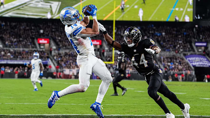 Detroit Lions wide receiver Amon-Ra St. Brown (14) makes a catch for a touchdown against Baltimore Ravens cornerback Marlon Humphrey (44) during the second half at M&T Bank Stadium in Baltimore, Md. on Monday, Sept. 22, 2025.