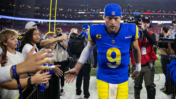 Jan 13, 2025; Glendale, AZ, USA; Los Angeles Rams quarterback Matthew Stafford (9) against the Minnesota Vikings during an NFC wild card game at State Farm Stadium.  