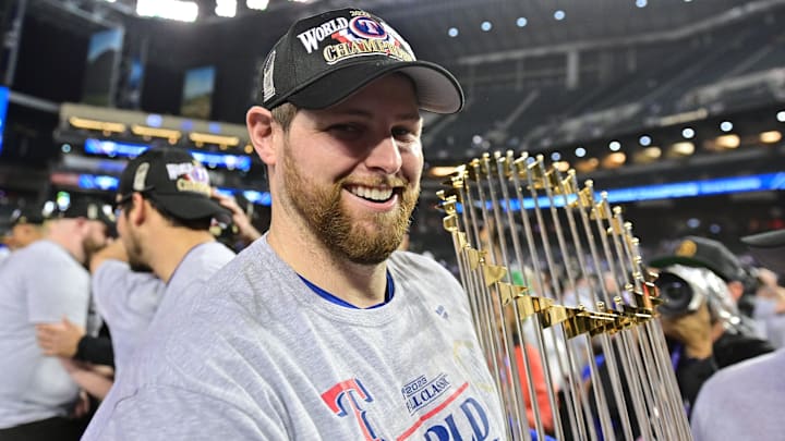 Nov 1, 2023; Phoenix, AZ, USA; Texas Rangers starting pitcher Jordan Montgomery (52) celebrates
