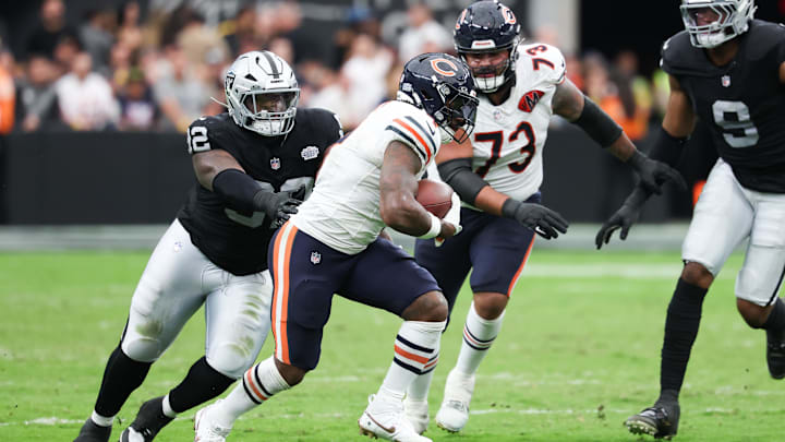 D'Andre Swift looks for more yardage against the Raiders. The Bears offensive line has underachieved, or has it? D'Andre Swift looks for more yardage against the Raiders. The Bears offensive line has underachieved, or has it?