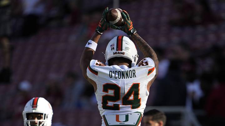 Sep 4, 2026; Stanford, California, USA;  Miami Hurricanes defensive back Ethan O'Connor (24) warms up prior to a game against the Stanford Cardinal at Stanford Stadium.  Mandatory Credit: Stan Szeto-Imagn Images