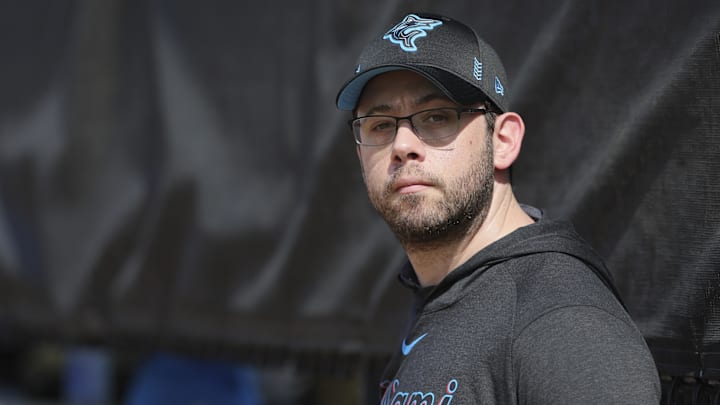 Miami Marlins president of baseball operations Peter Bendix watches a workout.