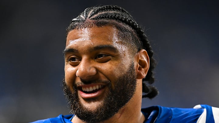 JT Tuimoloau of the Indianapolis Colts smiles