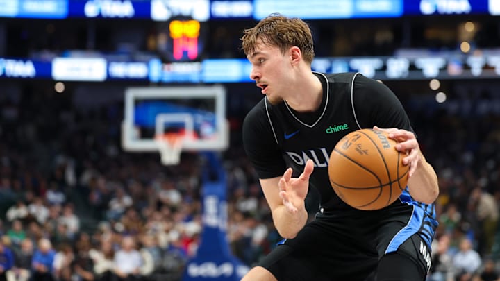 Jan 22, 2026; Dallas, Texas, USA; Dallas Mavericks forward Cooper Flagg (32) controls the ball against the Golden State Warriors during the second half at American Airlines Center. Jan 22, 2026; Dallas, Texas, USA; Dallas Mavericks forward Cooper Flagg (32) controls the ball against the Golden State Warriors during the second half at American Airlines Center.