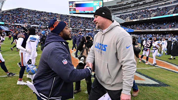 Bears interim coach Thomas Brown shakes hands with Lions coach Dan Campbell after the Lions 34-17 win at Soldier Field. 