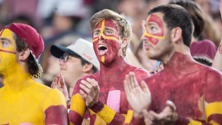 Florida State Seminole fans cheer on the football team as they play the Miami Hurricanes on Saturday, Oct. 4, 2025.