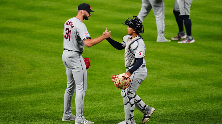 May 28, 2024; Denver, Colorado, USA; Cleveland Guardians pitcher Sam Hentges (31) and catcher Bo Naylor (23) celebrate defeating the Colorado Rockies at Coors Field. Mandatory Credit: Ron Chenoy-Imagn Images