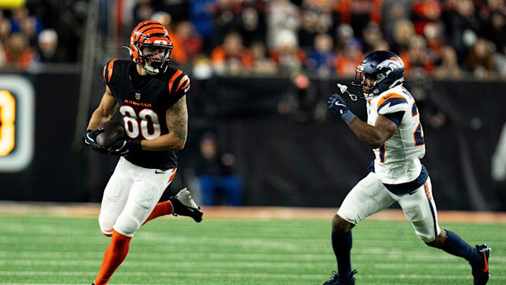 Cincinnati Bengals wide receiver Andrei Iosivas (80) runs downfield as Denver Broncos cornerback Ja'Quan McMillian (29) chases in the second quarter of the NFL game at Paycor Stadium in Cincinnati on Saturday, Dec. 28, 2024.